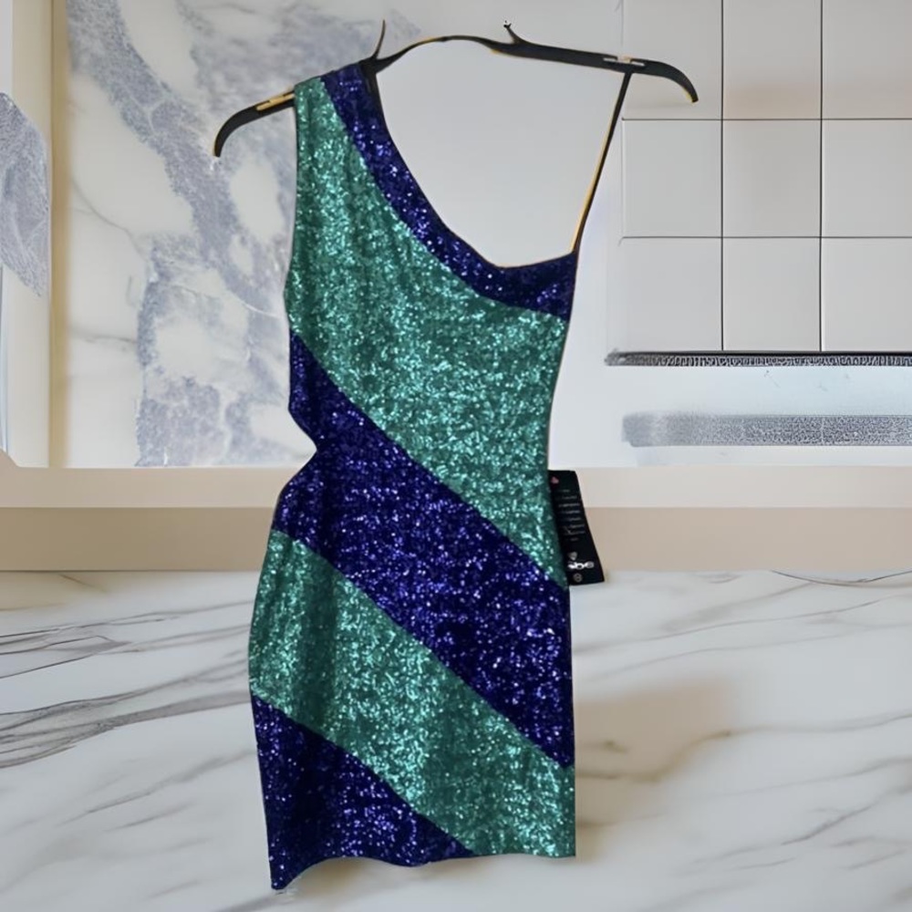 New with tags Bebe one shoulder cutout sequin blue teal dress